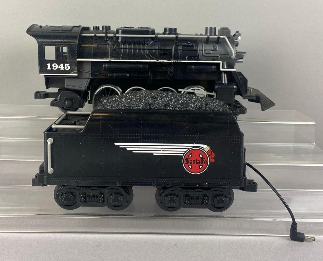 Lionel Trains Santa Fe G Scale 1945 Battery Operated Steam Locomotive and Tender: Untested. Locomotive measures 13 inches in length.
