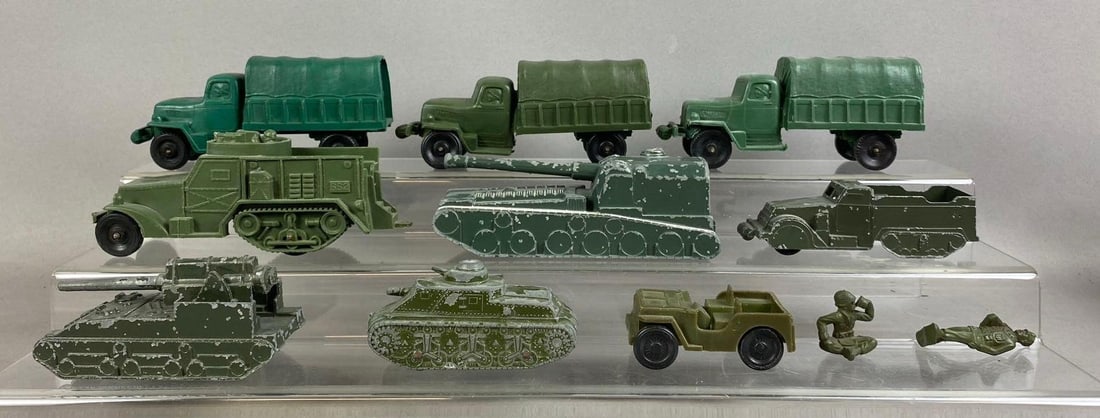 Group of Assorted 1950s Military Themed Vehicles: Largest measures 5 inches long. Stand not included.