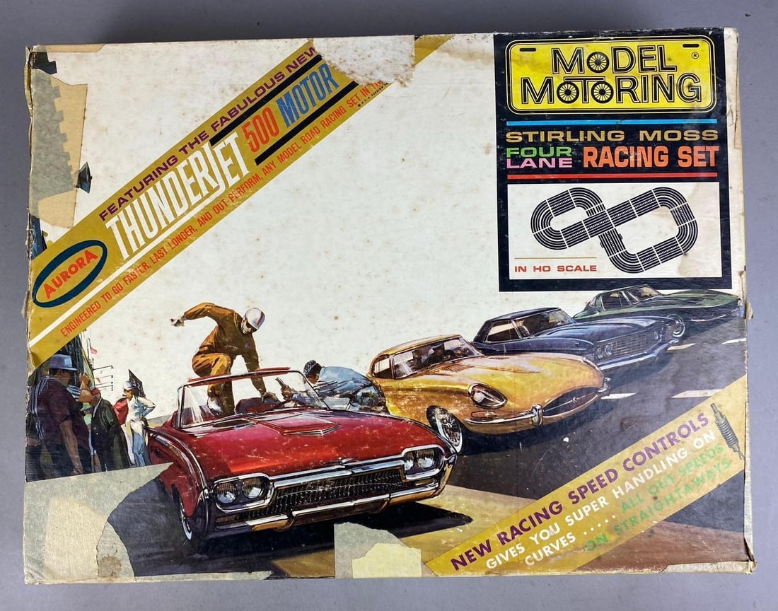 Vintage 1960s Aurora Thunderjet 500 Sterling Moss Racing Slot Car Set: Unknown condition. Missing slot cars. Measures H 3 1/2 x W 16 x L 21 inches.