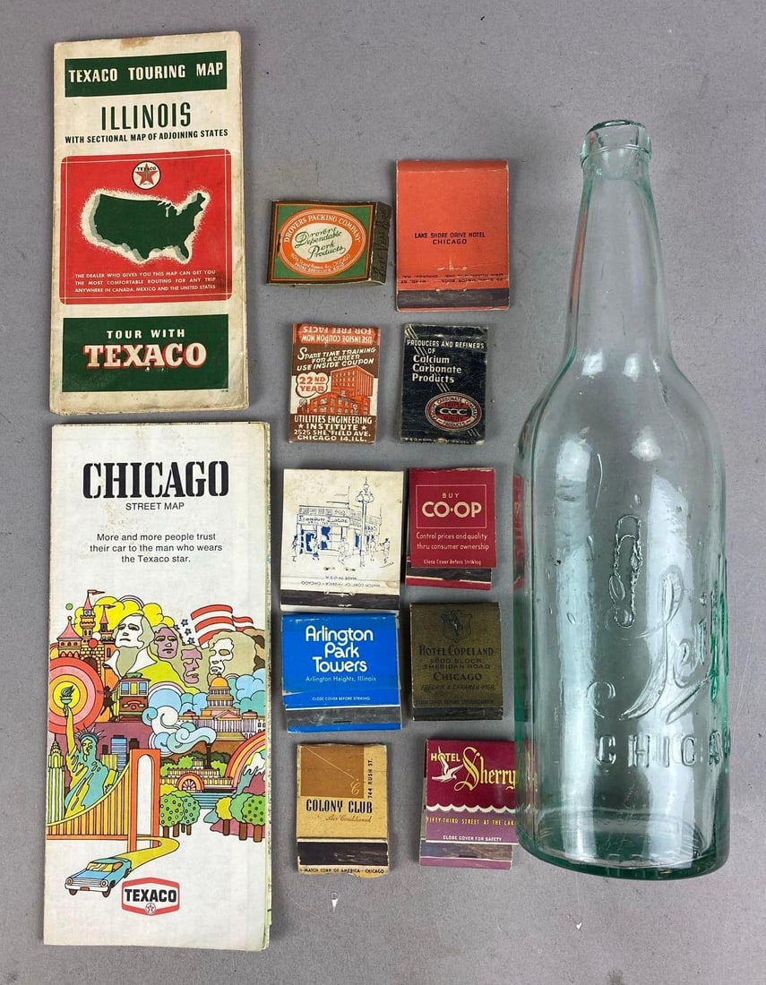 Group of Assorted Vintage Chicago land Memorabilia: Includes road maps, matchbooks, and 1908 Conrad Seipp Brewing Co. Beer Bottle. Bottle measures 11 1/2 inches tall. Has chips around top.