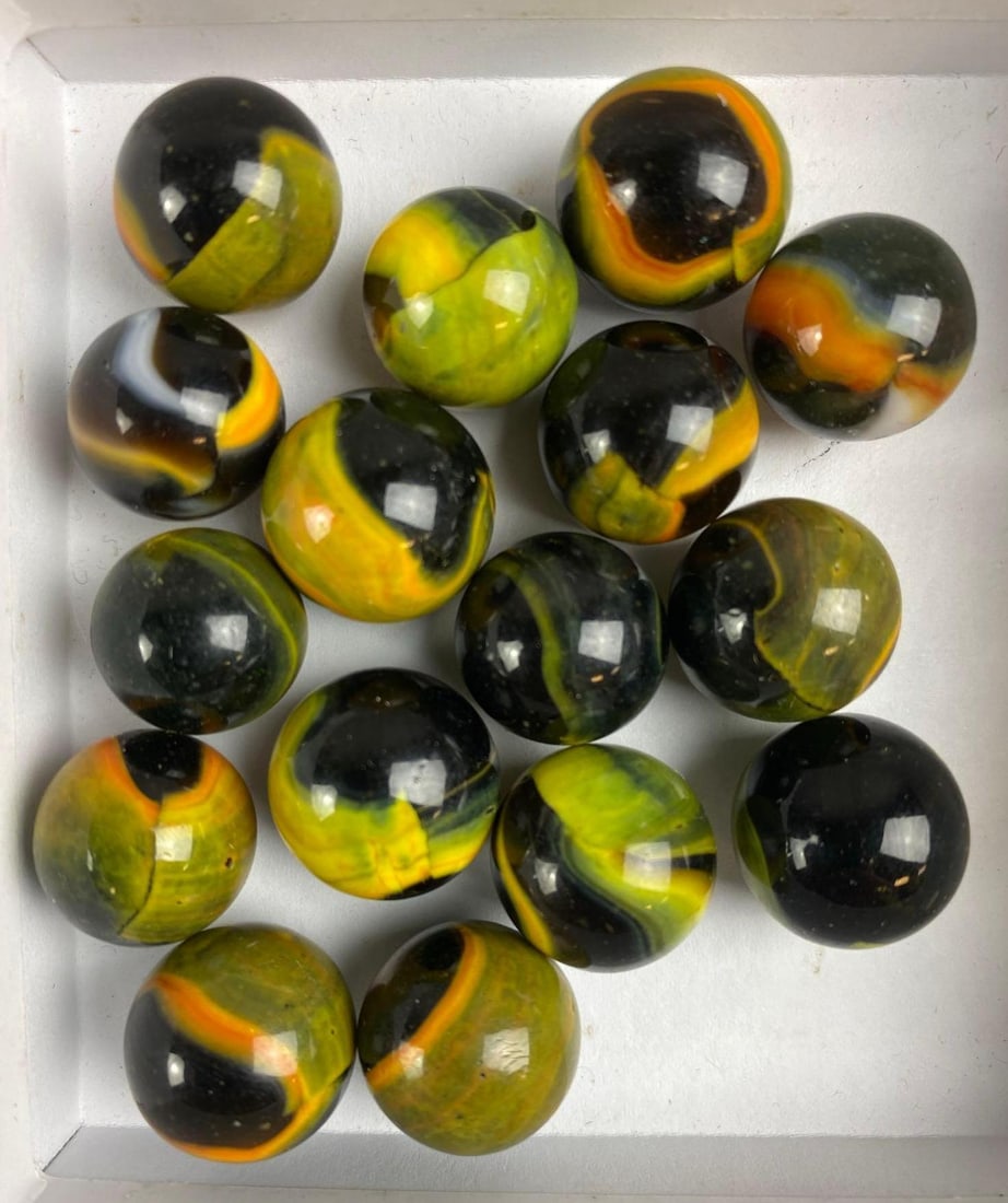 Group of 16 Vintage Peltier Champion Jr. Glass Marbles: Includes Black, Yellow, Orange Color Schemes.