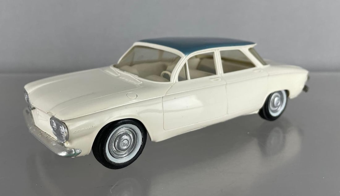 1960 Chevy Corvair 4 Door Dealership Promo Car: White / blue, white and silver interior, some warping