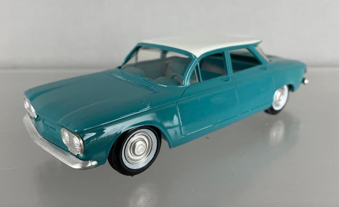 1960 Chevy Corvair 4 Door Dealership Promo Car: Turquoise / white, silver insert interior,