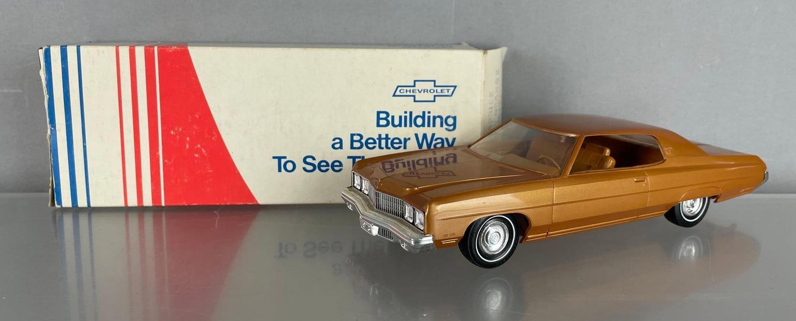 1973 Chevy Caprice Dealership Promo Car: Yellow orange metallic, rub on roof, original packaging