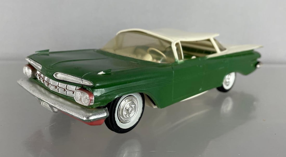 1959 Chevy Impala 4 Door Dealership Promo Car: Two tone green / white, warp especially on roof