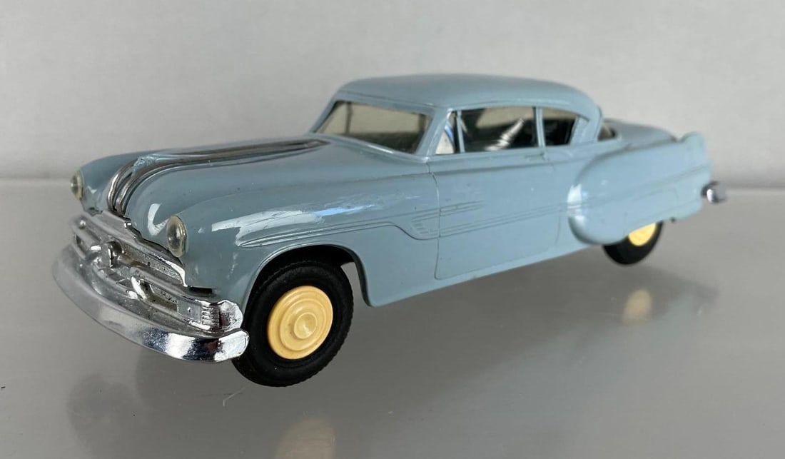 AMT 1953 Pontiac Dealership Promo Car: Light blue, working friction, scratching on roof