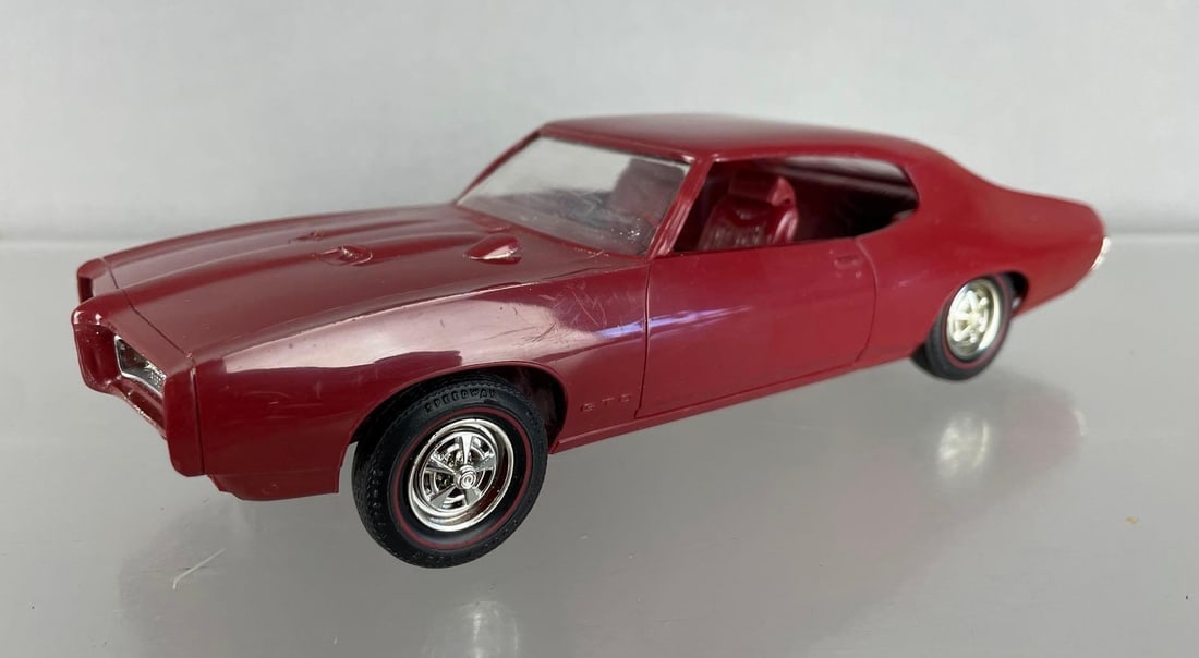 1969 Pontiac GTO Dealership Promo Car: Dark red, coaster, small scratches
