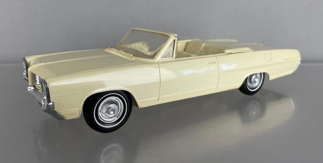 1964 Pontiac Bonneville Convertible Dealership Promo Car: Pale yellow, coaster, scratches and small scuffs, missing passenger pillar