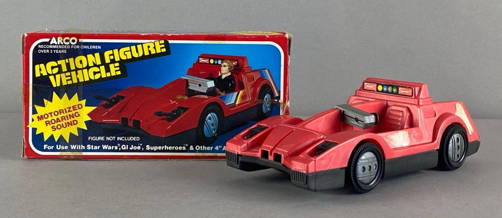 Arco Action Figure Friction Toy Vehicle: In working condition, In original box, box measures 4 inches H x 8 1/2 inches W x 3 inches D