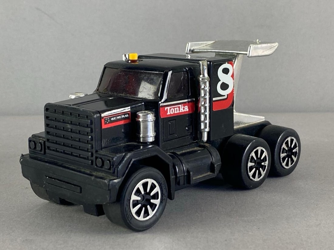 1980s Tonka Clutch Popper Black GMC General Friction Drag Semi: In working condition, measures 3 inches H x 2 1/2 inches W x 5 1/2 inches D