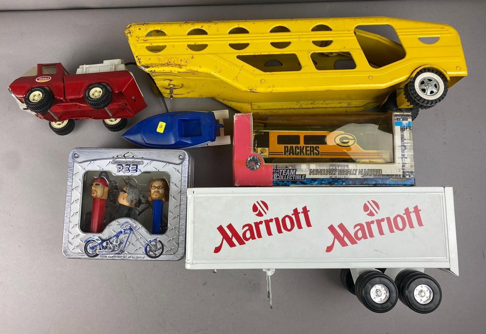 Group of Assorted Tonka Press Steel Trailers and More: Includes Pez Dispensers, boat, and more.