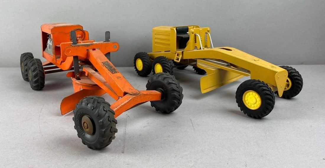 Grouo of 2 Vintage 1960s Press Steel Road Grader Vehicles: Rust and paint flakes throughout. Largest measures 17 inches long.