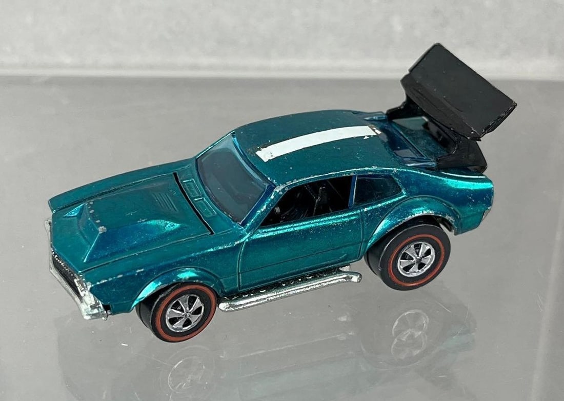 1969 Mattel Hot Wheels Redline Mighty Maverick Die-Cast Vehicle: Aqua Spectraflame, black interior, blue windows.