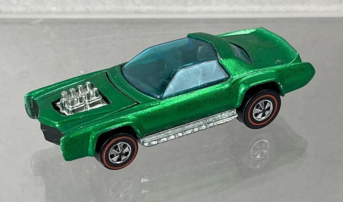 1969 Mattel Hot Wheels Redline Sugar Caddy Die-Cast Vehicle: Green Spectraflame, black interior, blue Windows.