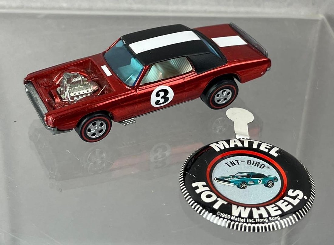 1969 Mattel Hot Wheels Redline TNT- Bird Die-Cast Vehicle: Includes Button, red with black roof, white interior, blue windows. Possible touch up paint.