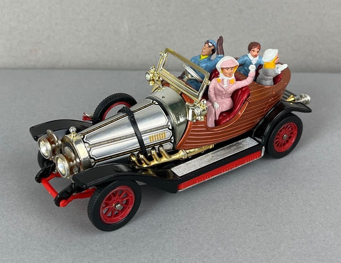 Corgi Chitty Chitty Bang Bang Die-Cast Vehicle: In working condition. Missing Front and Back Wings.