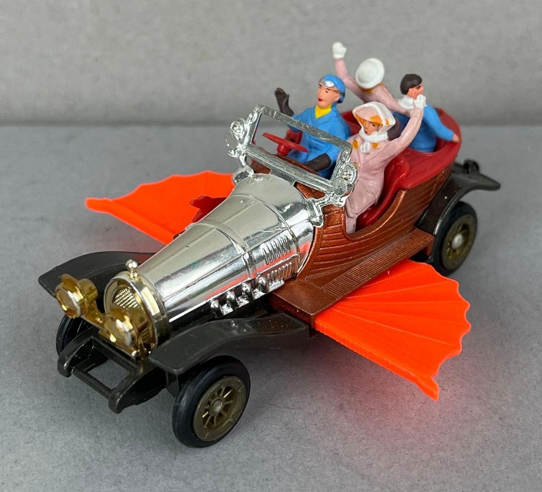 Corgi Chitty Chitty Bang Bang Die-Cast Vehicle: 1/64 scale. Missing front and back wing.
