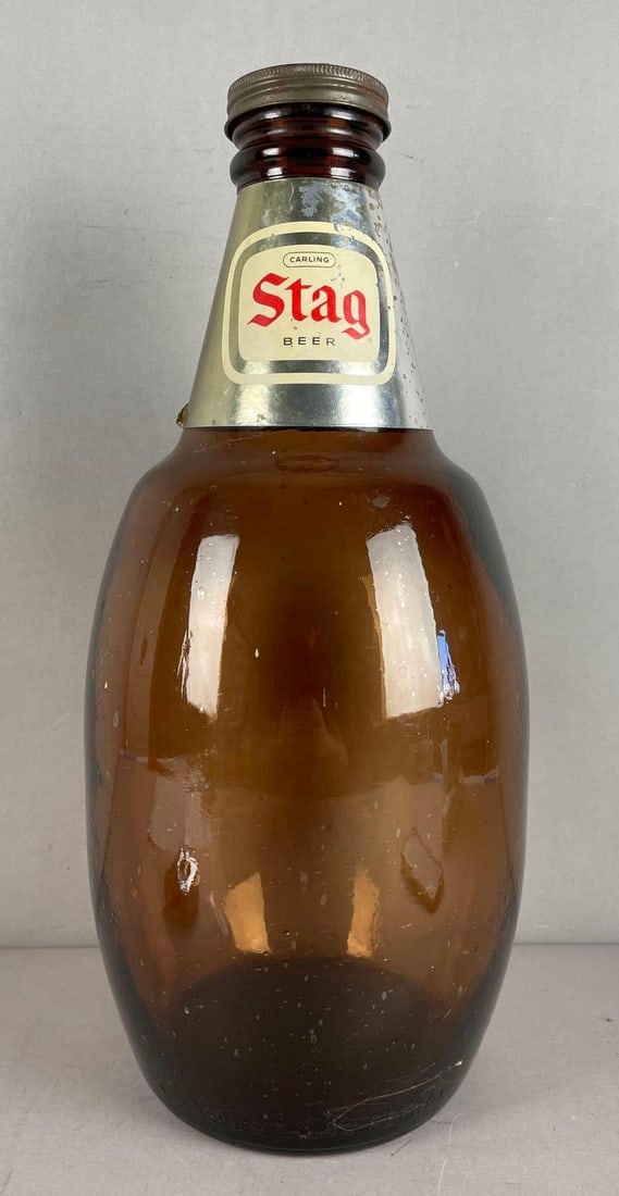 Carling Stag Beer Large Glass Advertising Bottle: Measures 18 1/4 inches x 8 1/2 inches