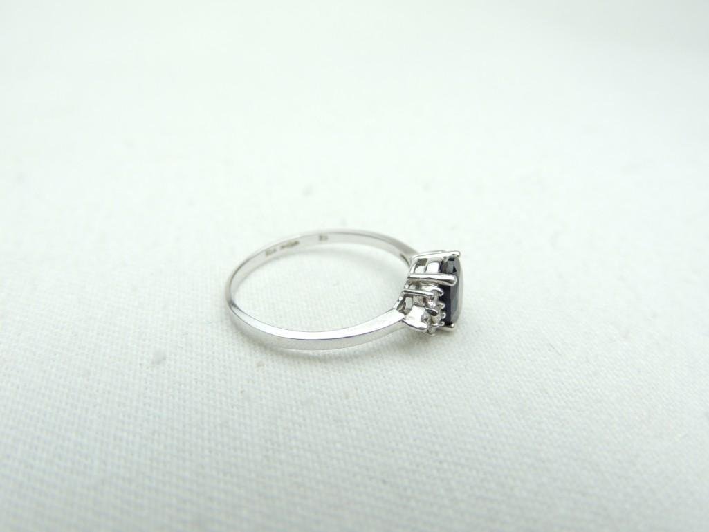 10K Gold Genuine Sapphire/Diamond Ring: 1.% Grams Size 7-7x5MM Oval Sapphire