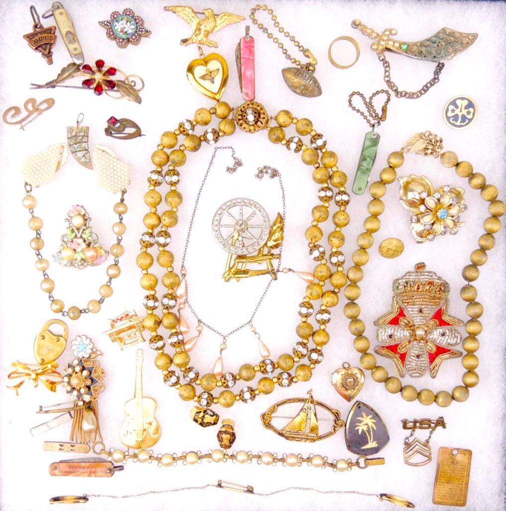 Group of Vintage Gold Tone Costume Jewelry: Some brass. Beads, pins, clips, lockets, bracelets, pendants, small pocket knives.
