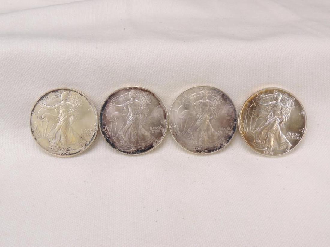 Group of 4 1994-P Silver American Eagles (1 of 3)
