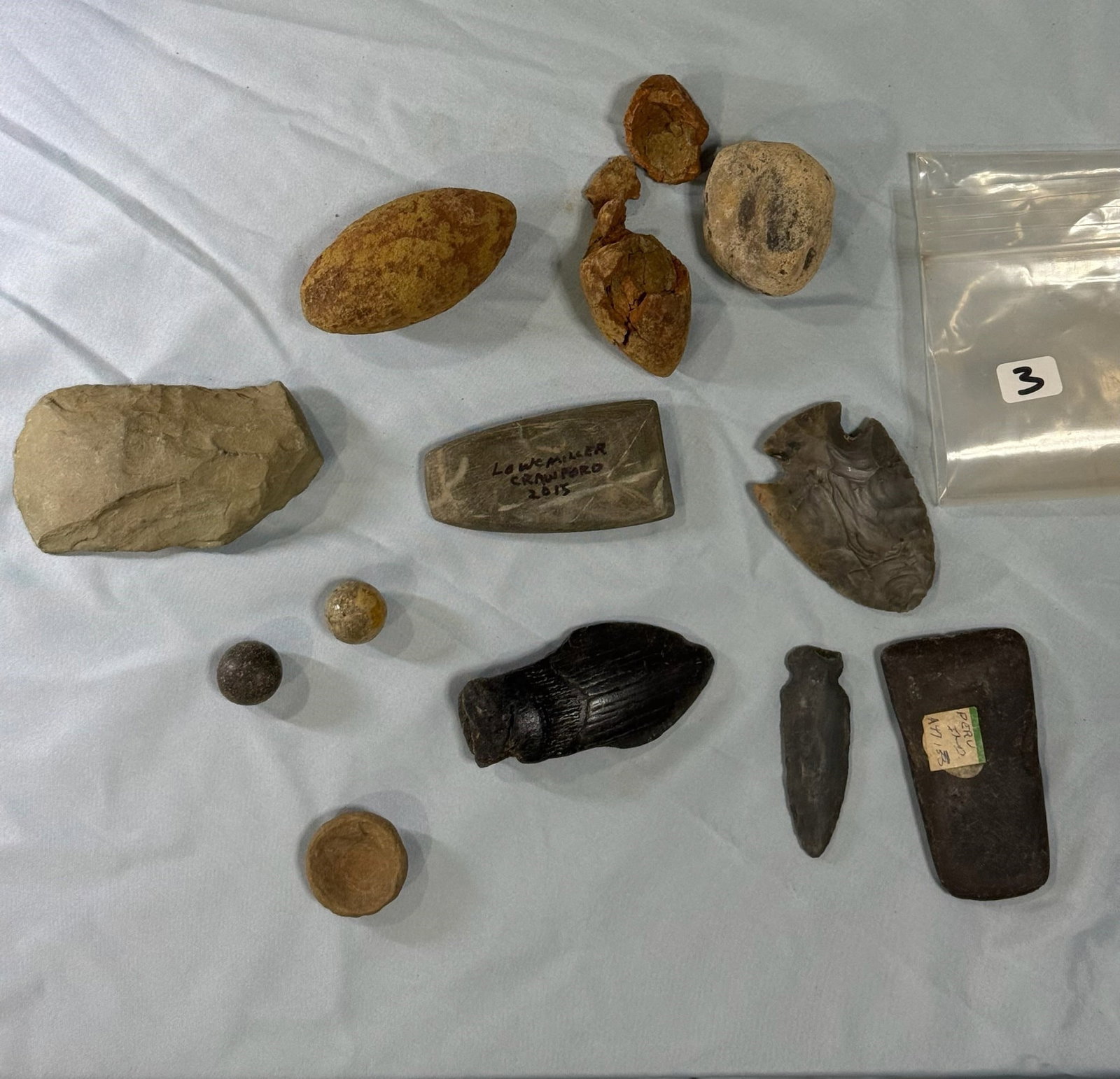 Indian Artificates: Various Indian artifacts. Largest measures 3-1/2 by 2 in.
