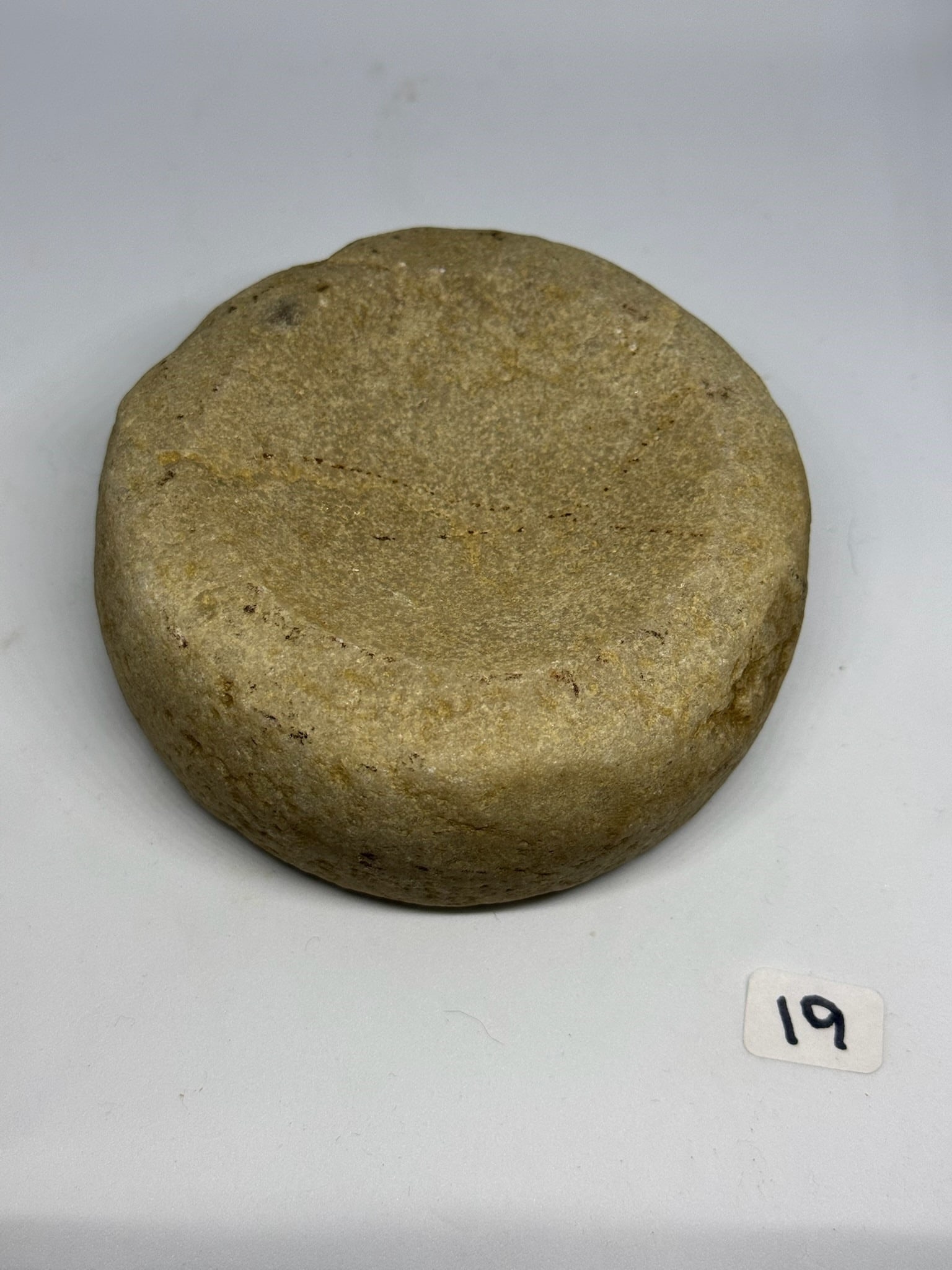 Sandstone Discoidal: 4 in. sandstone discoidal from Ohio.