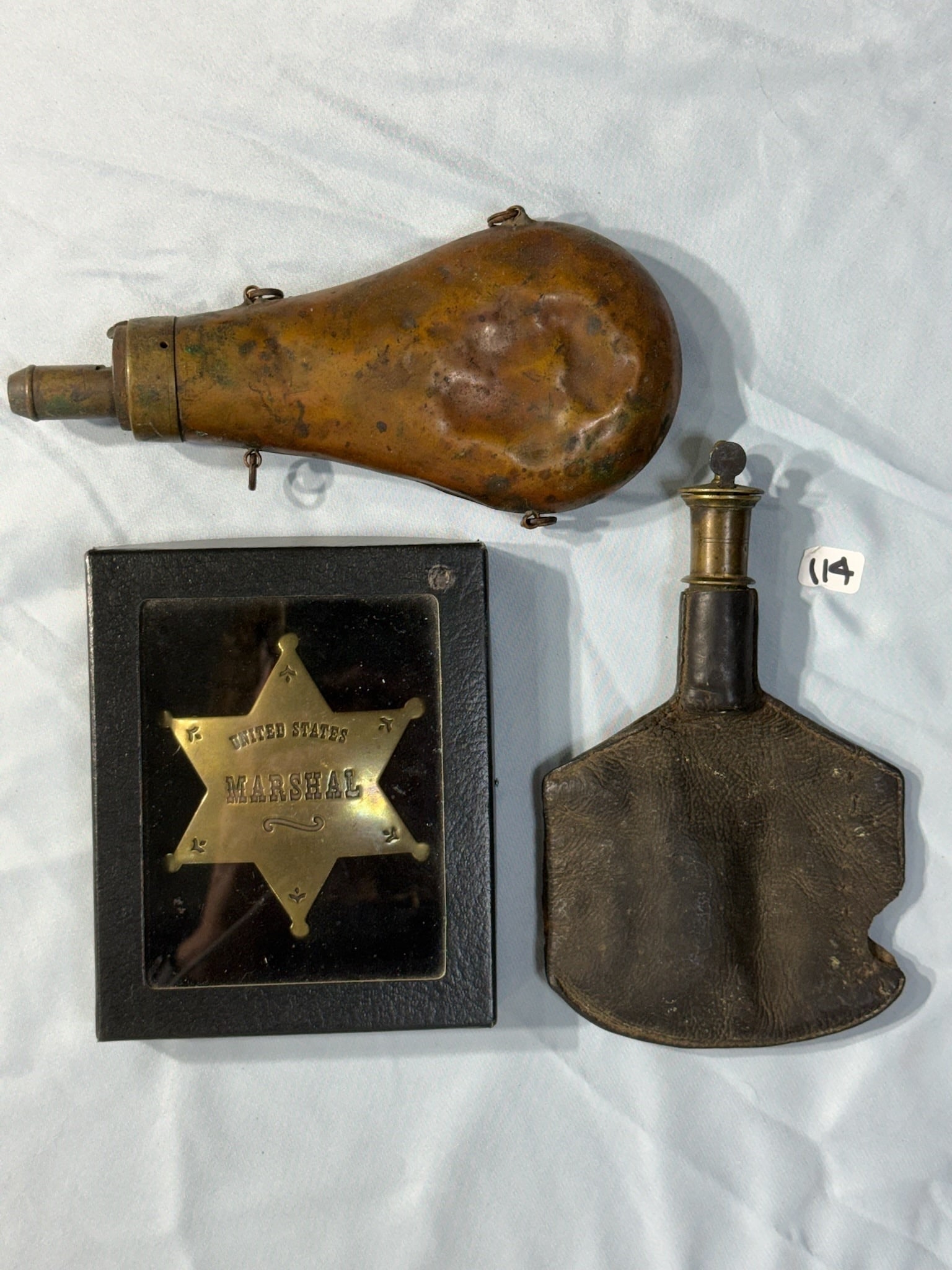 Powder horns US marshall badge: Group of 2 Powder Horns (1) U.S. Marshall Badge.