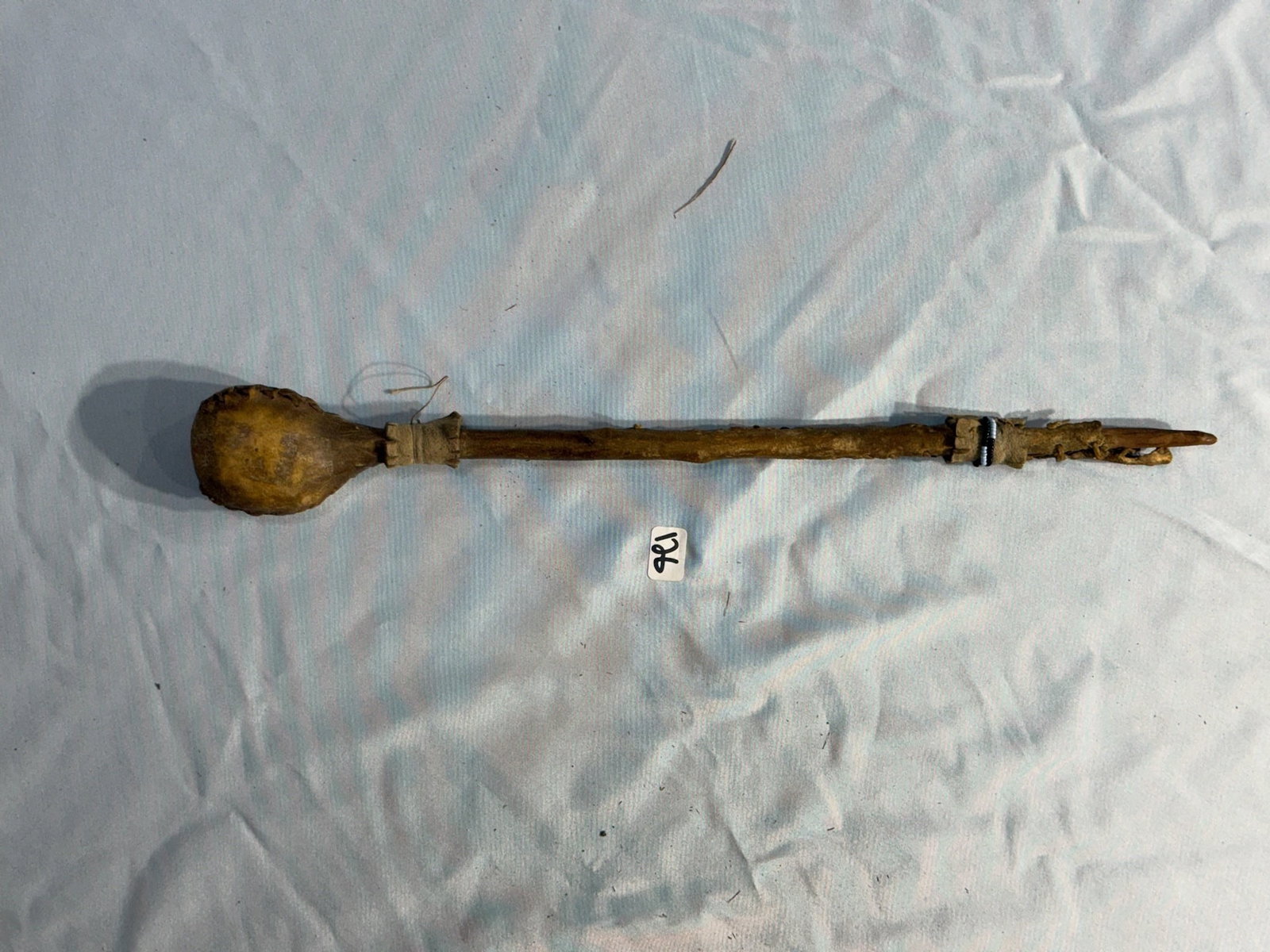 Leather headknocker: 13 1/2 in. Leather Bound Headknocker with beads - 1900's.