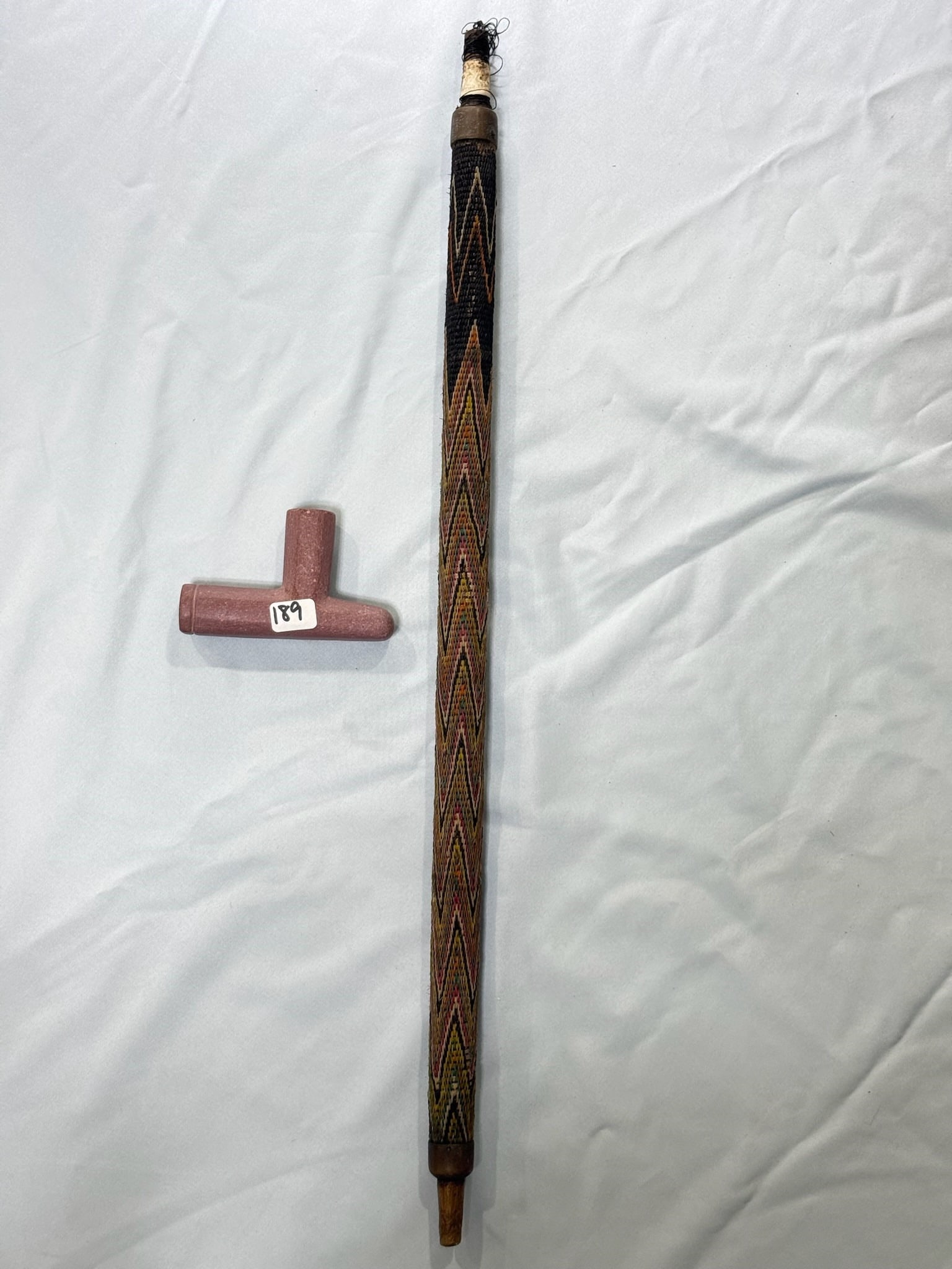 Catlinite Pipe and stem: 3 1/2 in. Catlinite Pipe - 21 1/2 in. stem.
