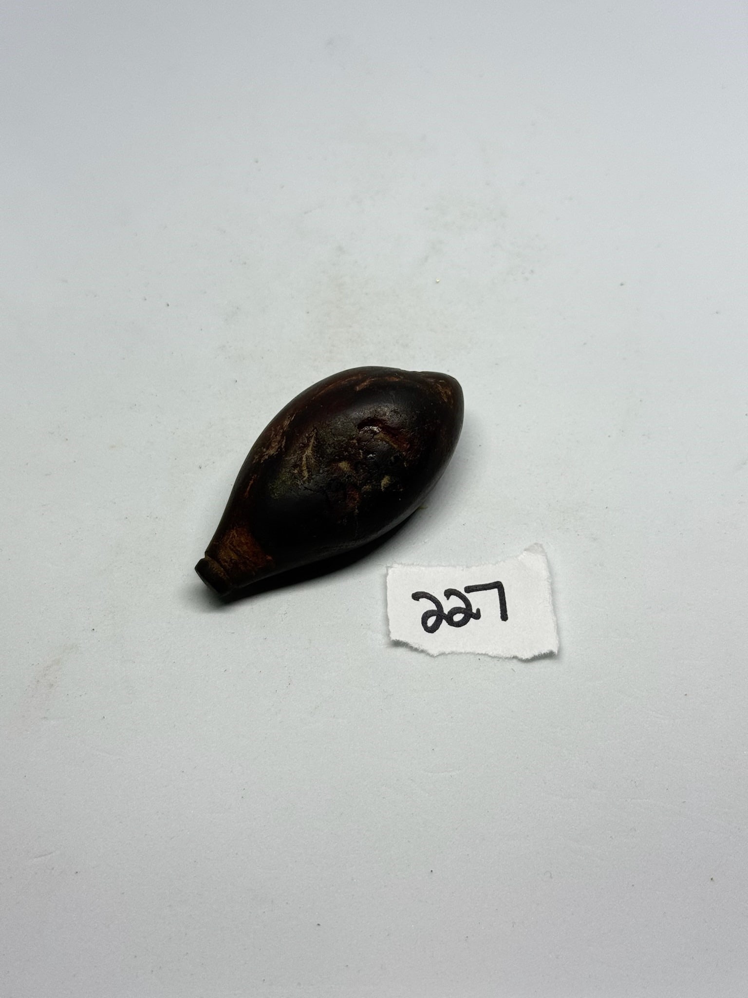 Hematite Plummet: 2 by 1 in. Hematite Plummet - Michigan - Ex Diller.