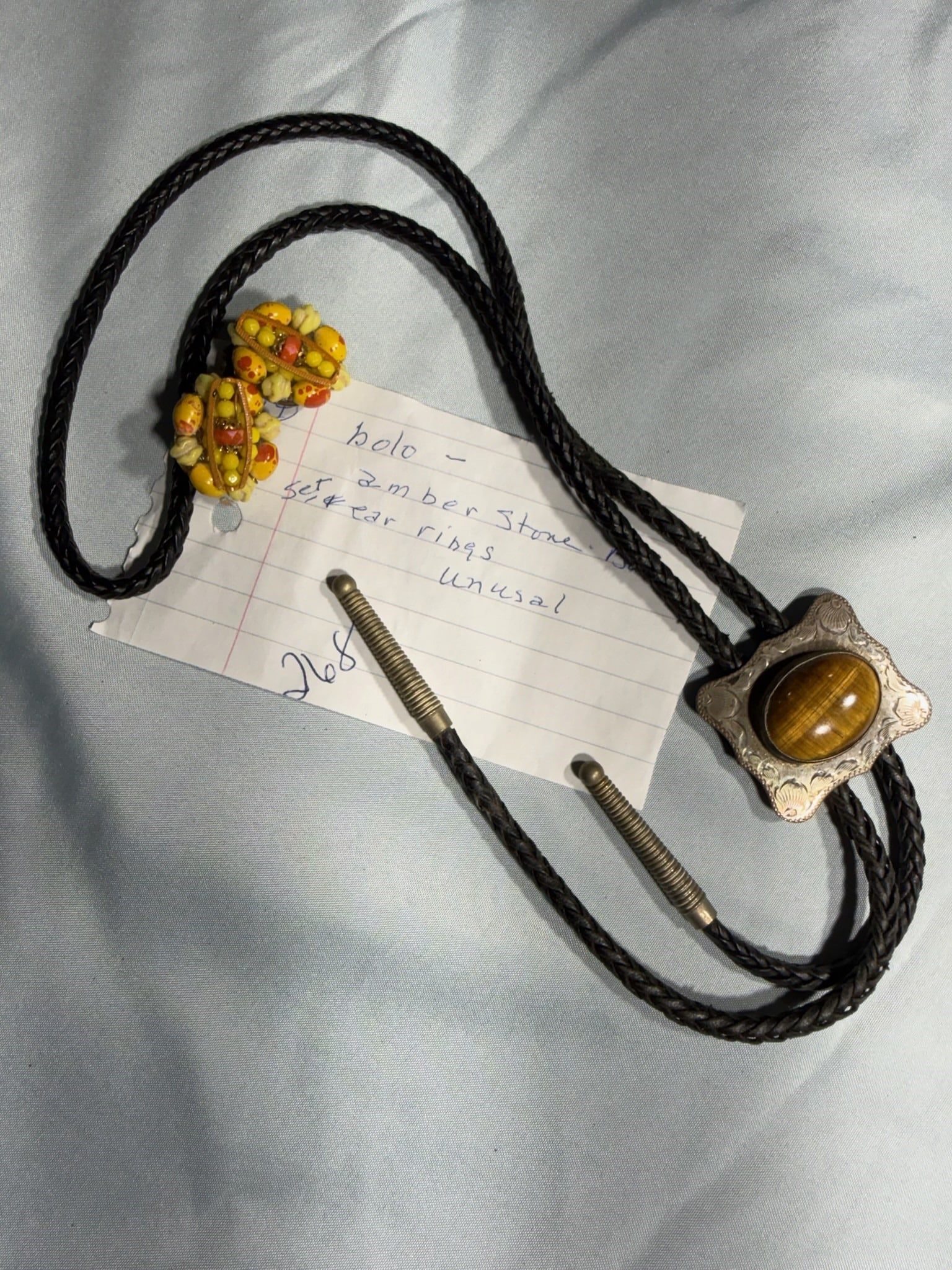 Amber Stone Bolo: Group of 1 Amber Stone Bolo, (1) pair of unusual Earrings.