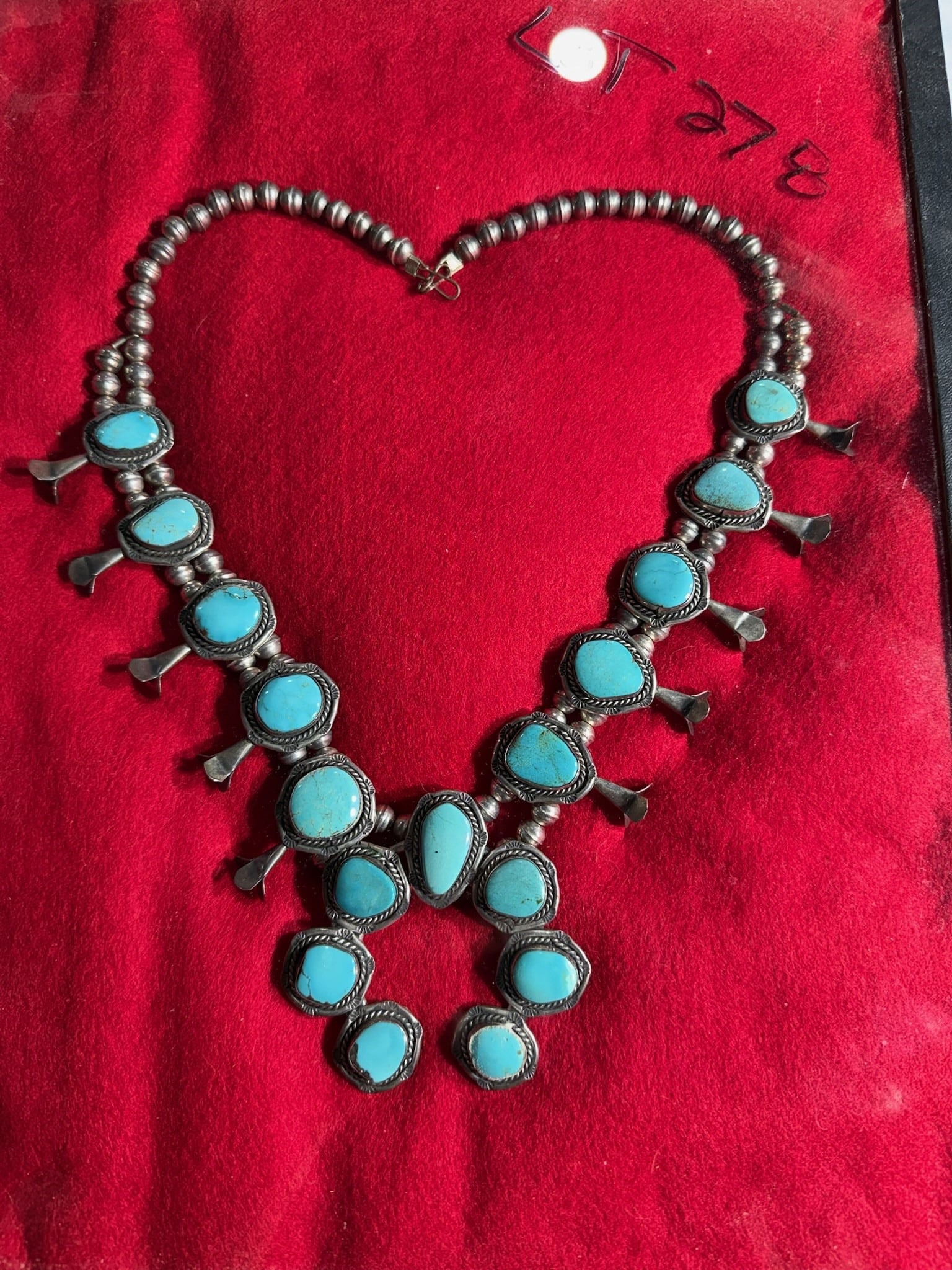 Zuni Concho Type Turquoise Squash Bloosom: 28 in. Zuni Concho Type Turquoise and Sterling Necklace - 1960's - purchased by Marilu Diller.