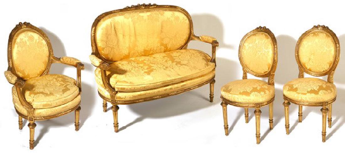 Louis XV Syle Gilt 5pcs Settee and chairs: Louis XV Syle Gilt Wood 5pcs Settee and chairs. Late 19th Century includes 48" wide settee, two matching arm chairs and two side chairs. All with reeded and carved legs, reeded and floral carved seat