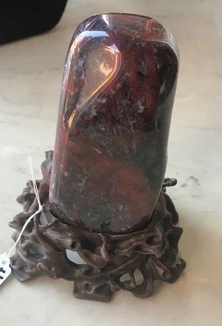 A Carved Natural Chicken Blood Stone Statue on Stand (1 of 2)