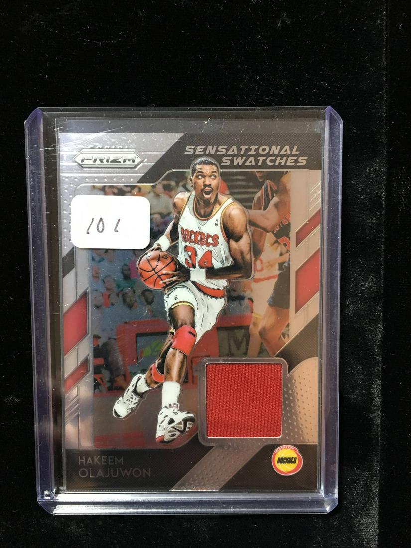 PANINI PRIZM BASKETBALL GAME USED JERSEY CARD: HAKEEM OLAJUWON HOUSTON ROCKETS GAME USED JERSEY CARD