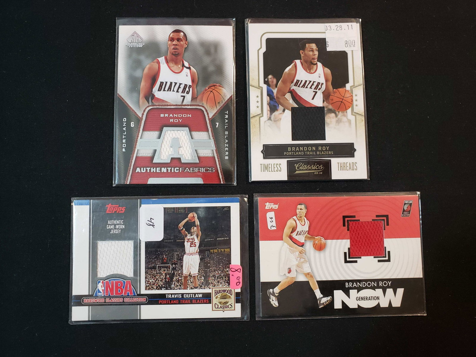 PORTLAND TRAILBLAZERS "RIP" CITY GAME WORN RELIC CARD: TRAVIS OUTLAW AND BRANDON ROY JERSEY CARDS TIMELESS THREADS #'D 034/199