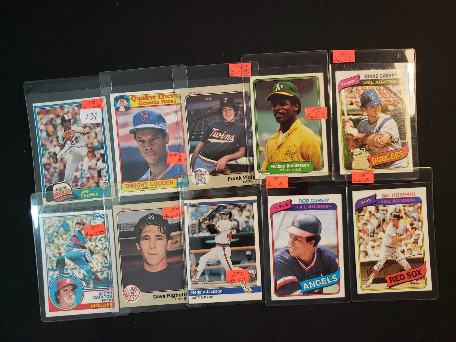 VINTAGE BASEBALL CARDS LEGENDS AND HALL OF FAMER LOT OF: JIM PALMER, STEVE GARVEY, RICKEY HENDERSON, DOC GOODEN, YAZ, STEVE CARLTON
