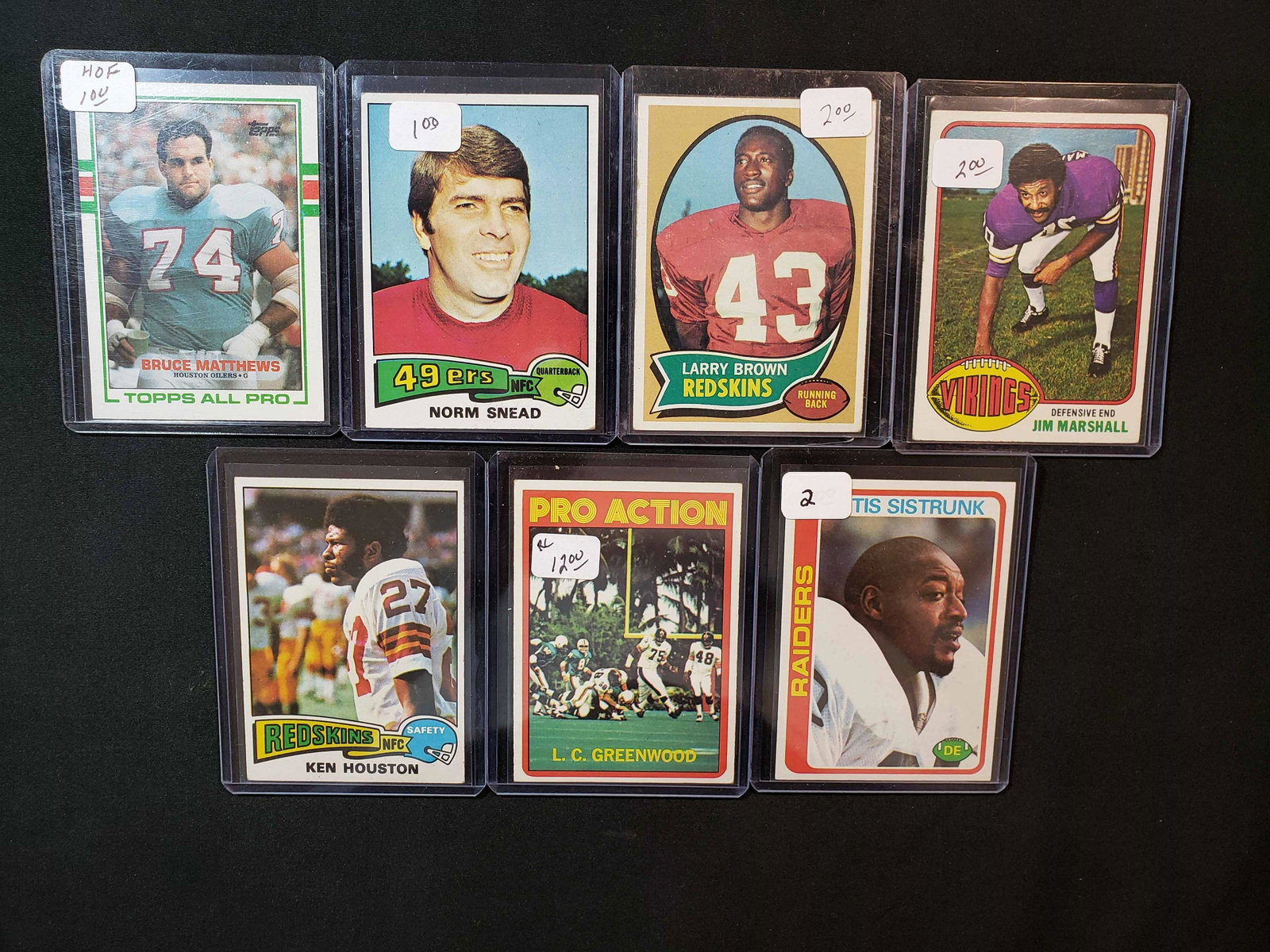 VINTAGE NFL FOOTBALL CARD COLLECTION: 1970'S NFL FOOTBALL CARD LOT RAIDERS LC GREENWOOD STEELERS ROOKIE IN ACTION, KEN HOUSTON, JIM MARSHALL, NORM SNEAD, BRUCE MATTHEWS