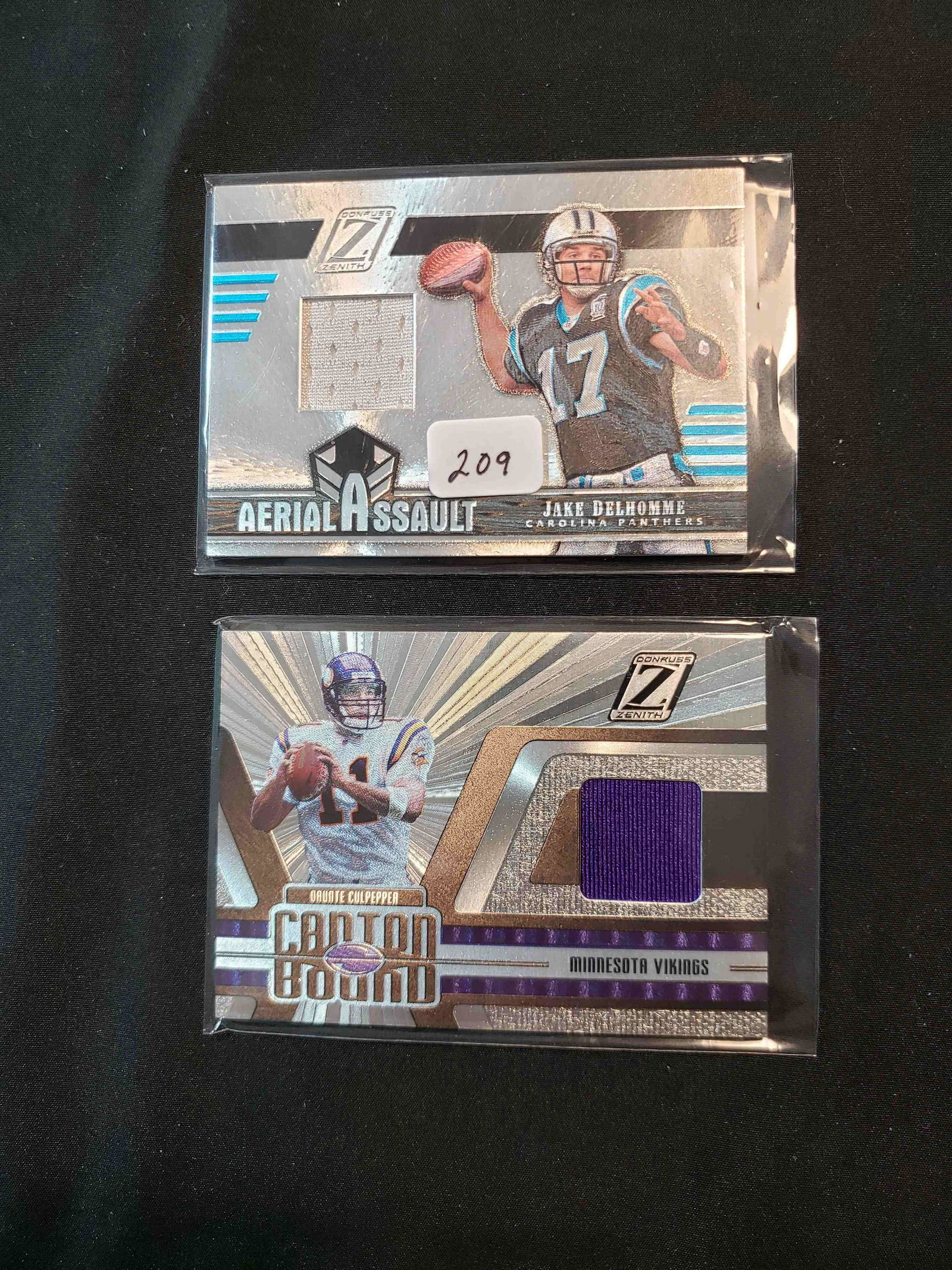 DONRUSS ZENITH GAME USED MEMORABILIA CARDS: JAKE DELHOMME PANTHERS 196/250, DAUNTE CULPEPPER MINNESOTA VIKINGS 151/199