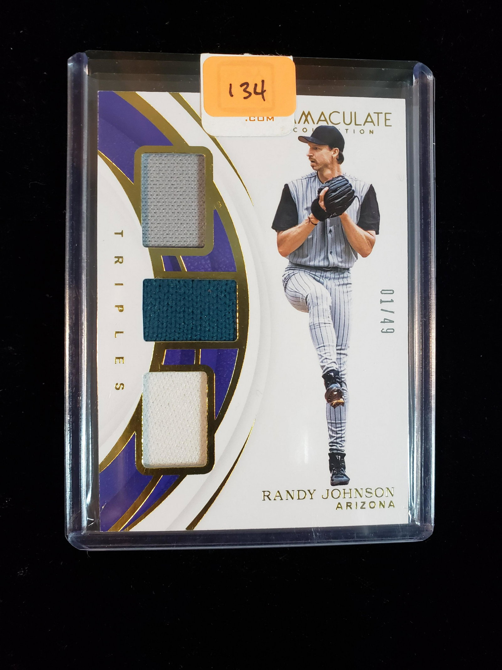 PANINI IMMACULATE BASEBALL TRIPLE RELIC 01/49: FIRST OFF THE LINE 01/49 RANDY JOHNSON TRIPLE PATCH CARD