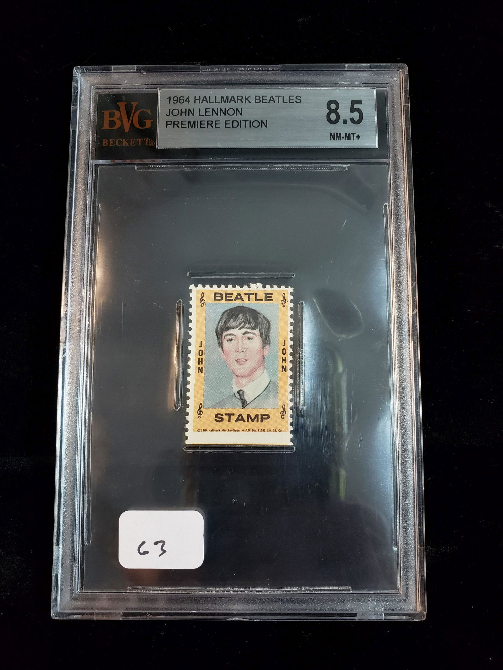 GRADED 1964 BEATLES JOHN LENNON STAMP: 1964 HALLMARK BEATLES JOHN LENNON PREMIERE EDITION COLLECTORS STAMP SLABBED ANDGRADED 8.5/10 NM-MT+