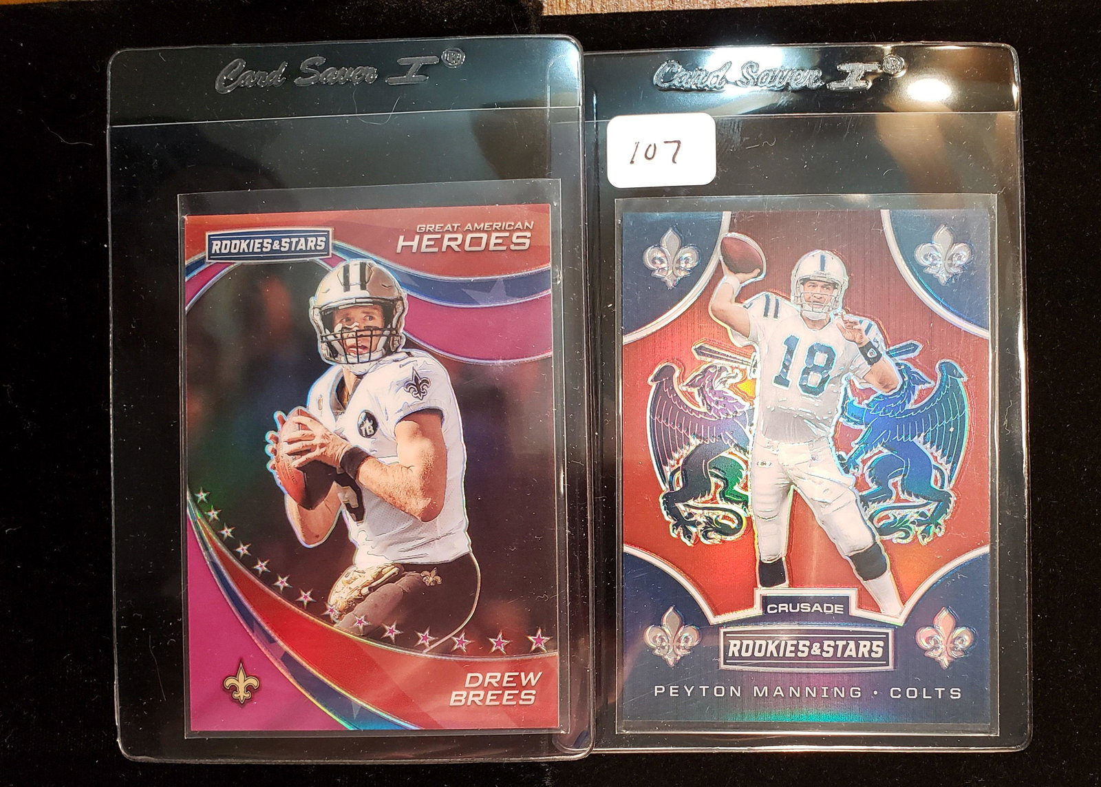 2019 ROOKIES AND STARS SERIAL NUMBERED LOT: PEYTON MANNING CRUSADE 40/75, DREW BREES "GREAT AMERICAN HEROS INSERT 28/35