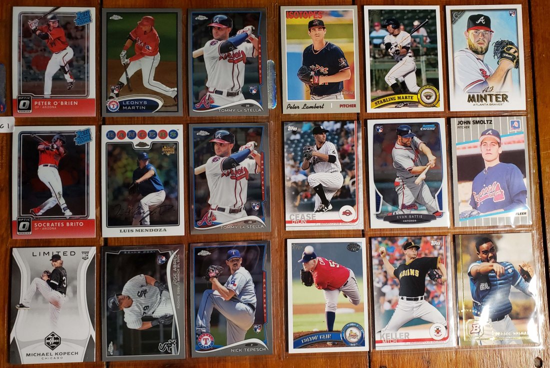 2-BINDER PAGES OF ROOKIE BASEBALL CARDS: LOT OF 18 TOP ROOKIE AND PROSPECT CARDS IN MINT CONDITION. LUIS MENDOZA, MICHAEL KOPECH, STARLING MARTE, PETER LAMBERT, JOHN SMOLTZ, DYLAN CEASE.