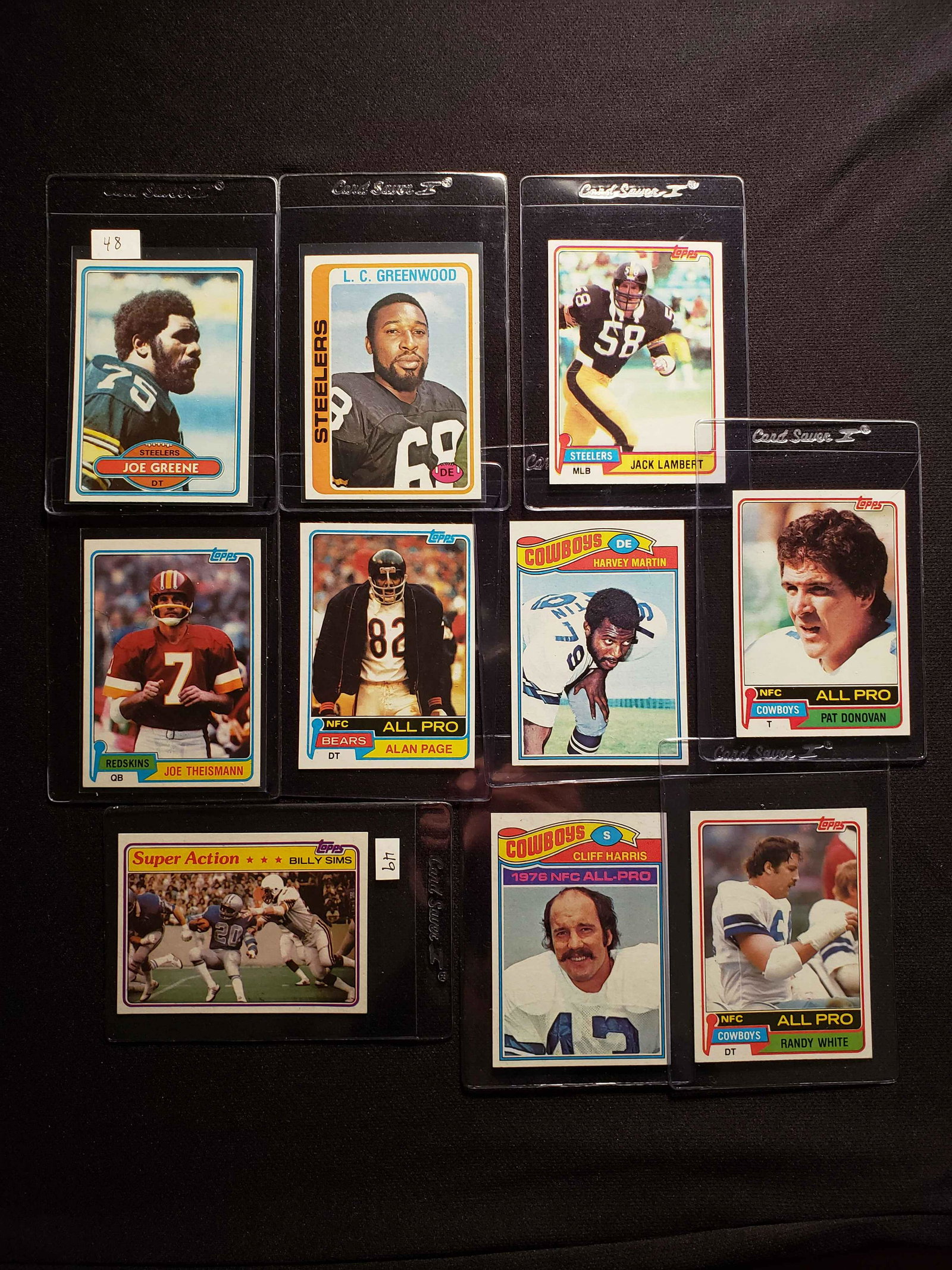 VINTAGE NFL FOOTBALL CARDS STARS AND HALL OF FAMERS: MINTY FRESH LOT OF 9 FOOTBALL STARS RANDY WHITE, CLIFF HARRIS, JACK LAMBERT, LC GREENWOOD, MEAN JOE GREENE, ALAN PAGE, JOE THEISMANN