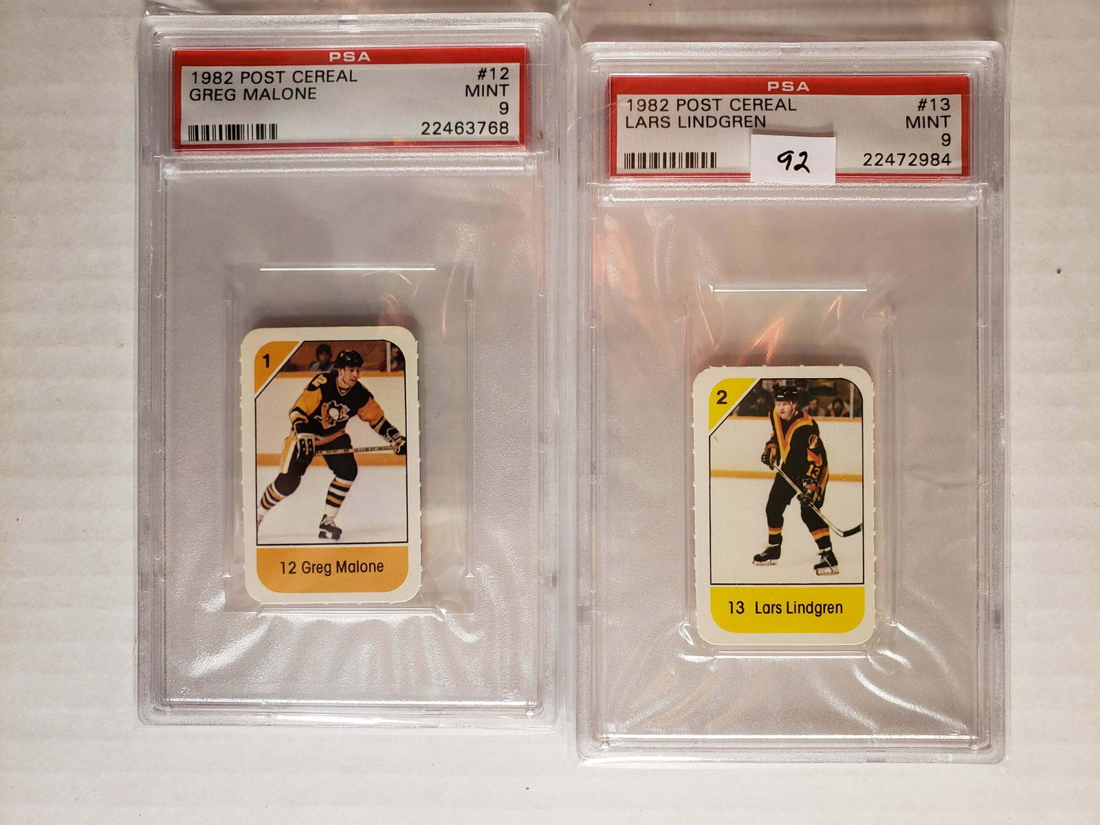 LOT OF 2 PSA GRADED HOCKEY CARDS: 1992 MINI POST CEREAL CARDS LARS LINDGREN, AND GREG MONROE