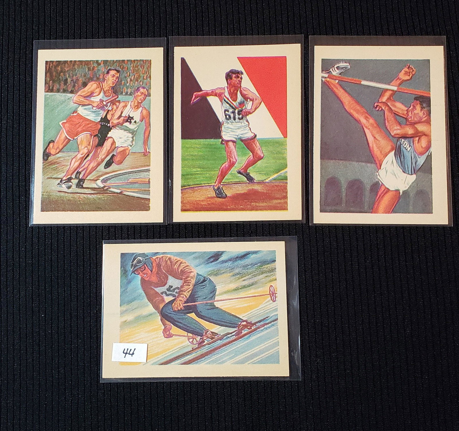1956 GUM INC., ADVENTURE CARDS HIGH GRADE NRMT+: LOT OF 4 SHARP 1956 ADVENTURE TRADING CARDS TRACK AND FIELD CARDS