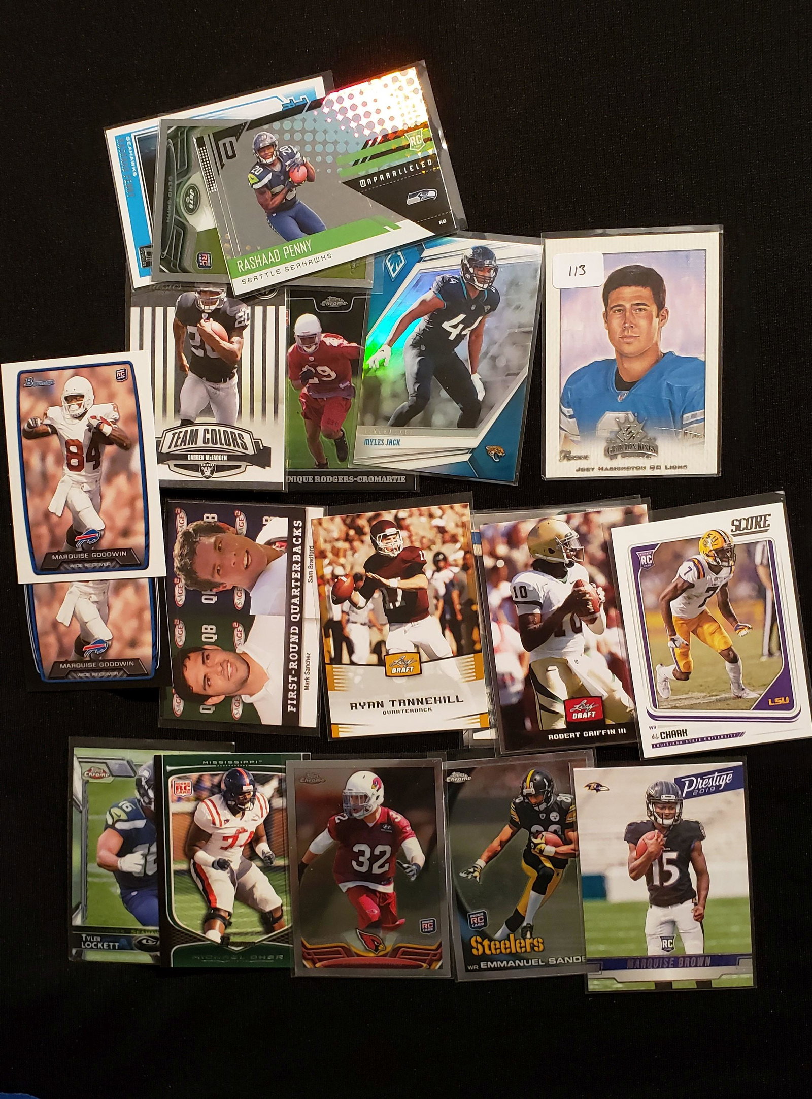 LOT OF 20 BETTER NFL FOOTBALL ROOKIE CARDS: JOEY HARRINGTON, HEISMAN WINNER ROBERT GRIFFIN JR. RC, TYLER OCKETT, TYRANN MATHIEU