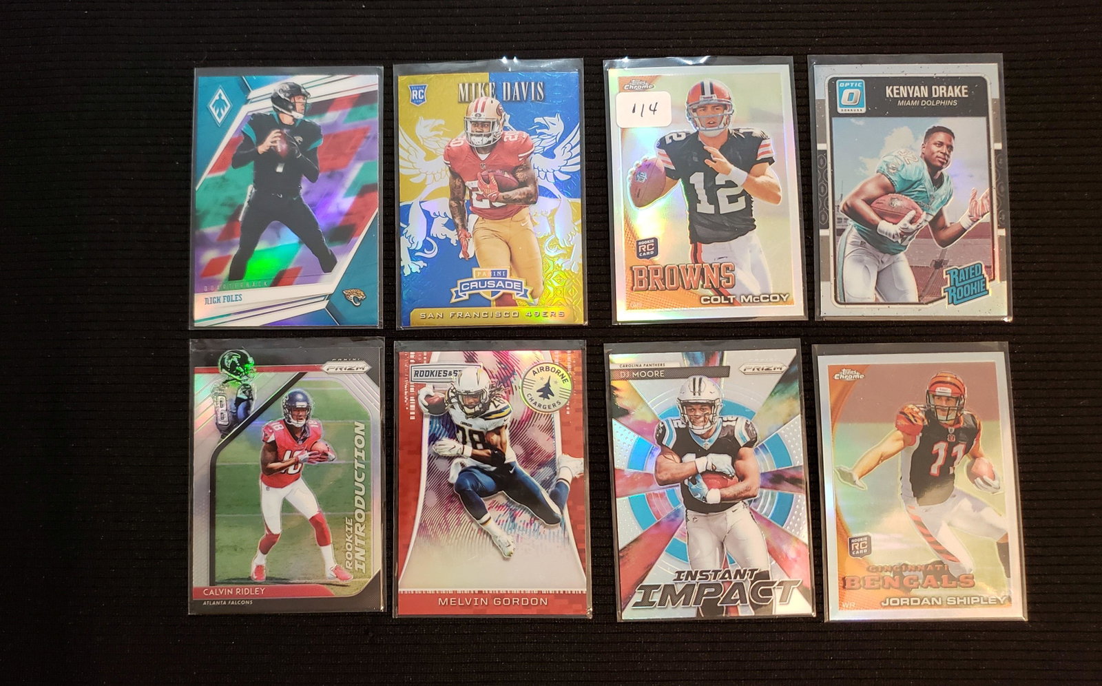 LOT OF 8 NFL FOOTBALL SP REFRACTORS: COLT MCCOY ROOKIE, NICK FOLES JAGS, MELVIN GORDON, CALVIN RIDLEY SILVER PRIZM ROOKIE
