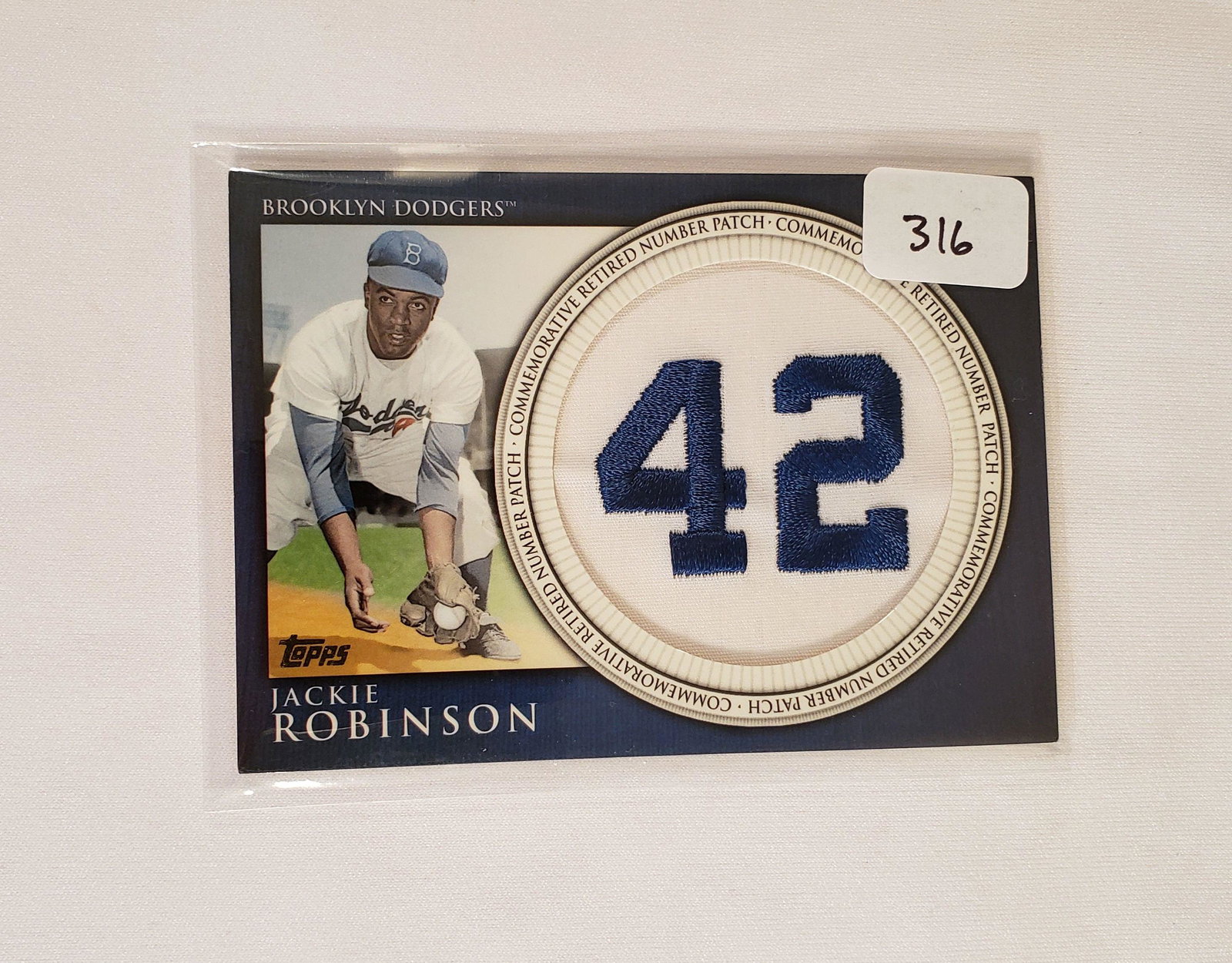 JACKIE ROBINSON #42 RETIRED NUMBER PATCH CARD: JACKIE ROBINSON COMMEMORATIVE RETIRED NUMBER 42 PATCH CARD
